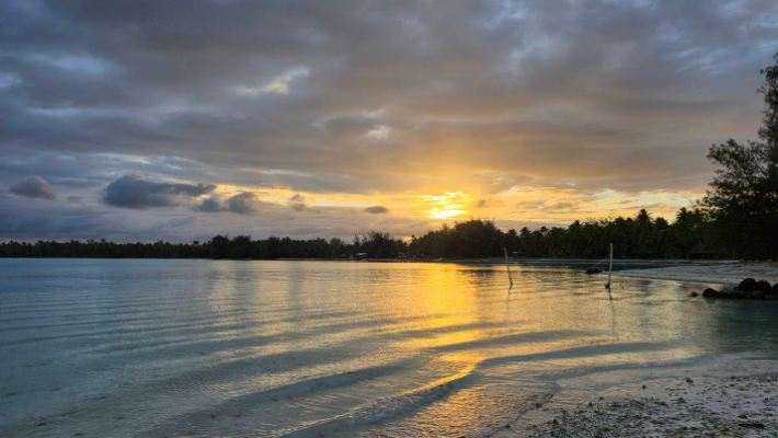A calm lake at sunset