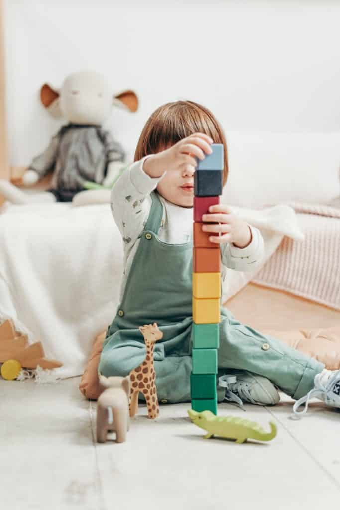 Child with building blocks