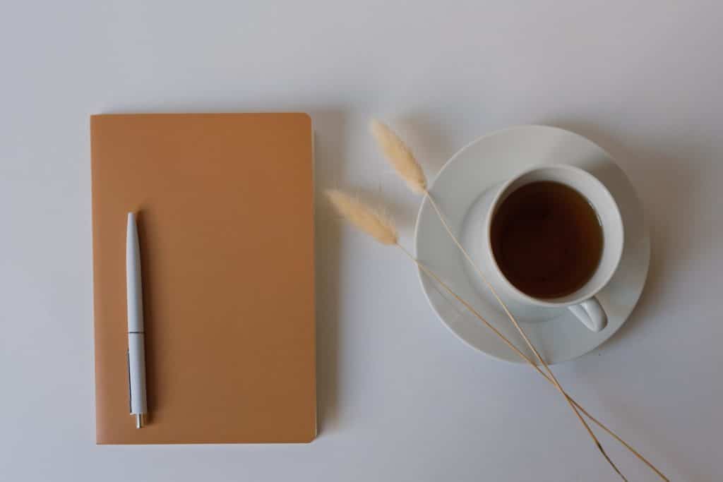 journal and coffee