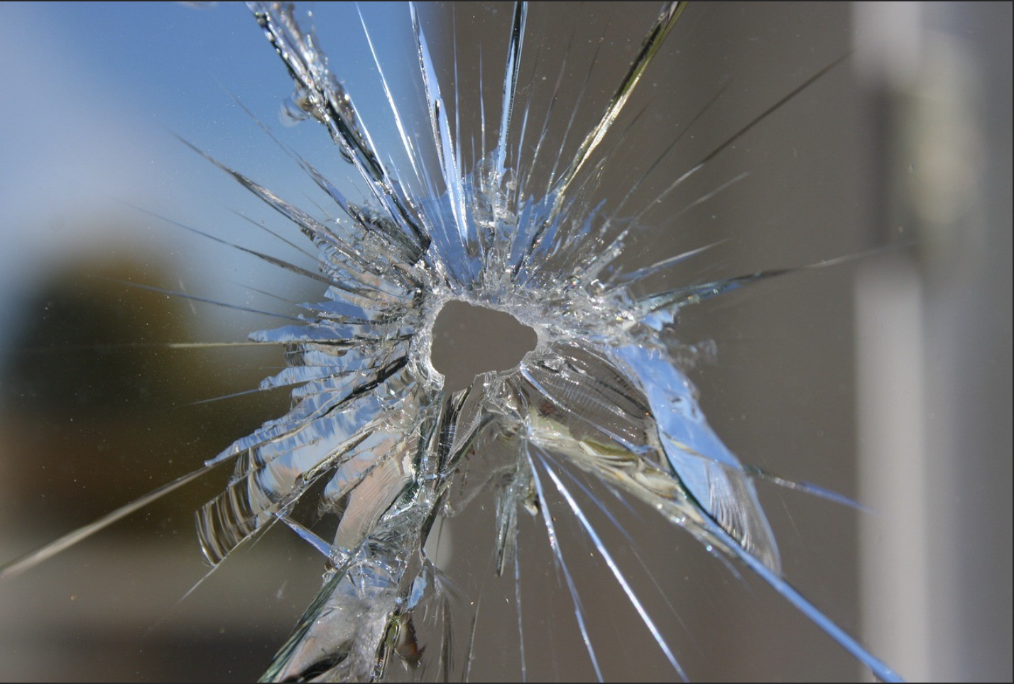 gunshot through glass